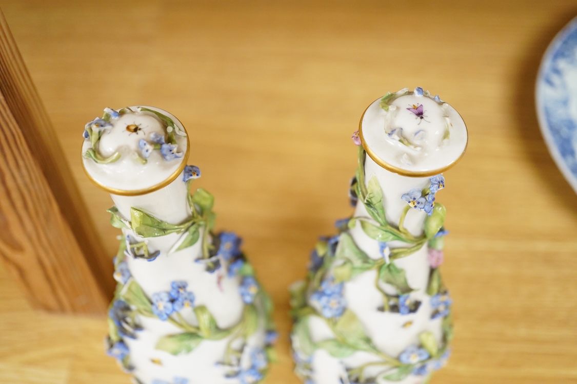 A pair of late 19th century Meissen flower encrusted vases and covers, 20cm high